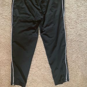Champions jogging pants, zip up in the sides